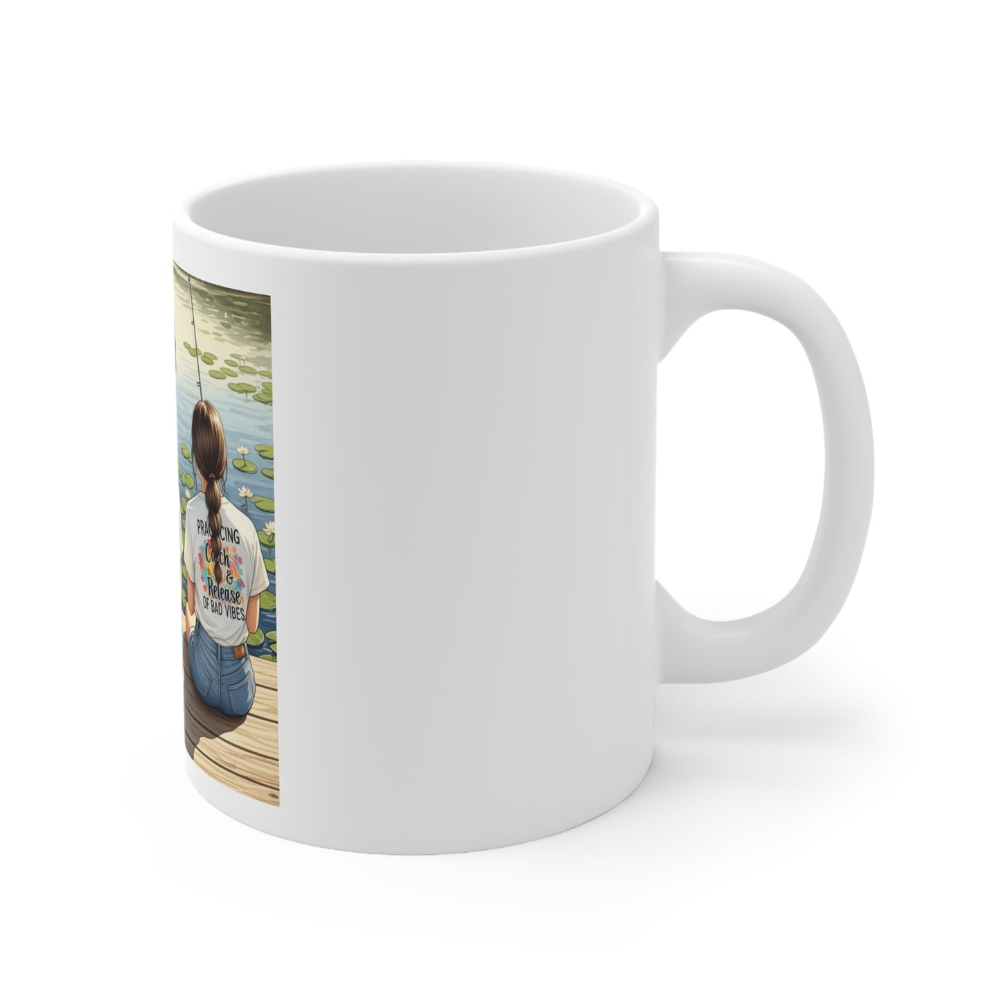 Side view of White mug with a photo of a person sitting by a lake on one side
