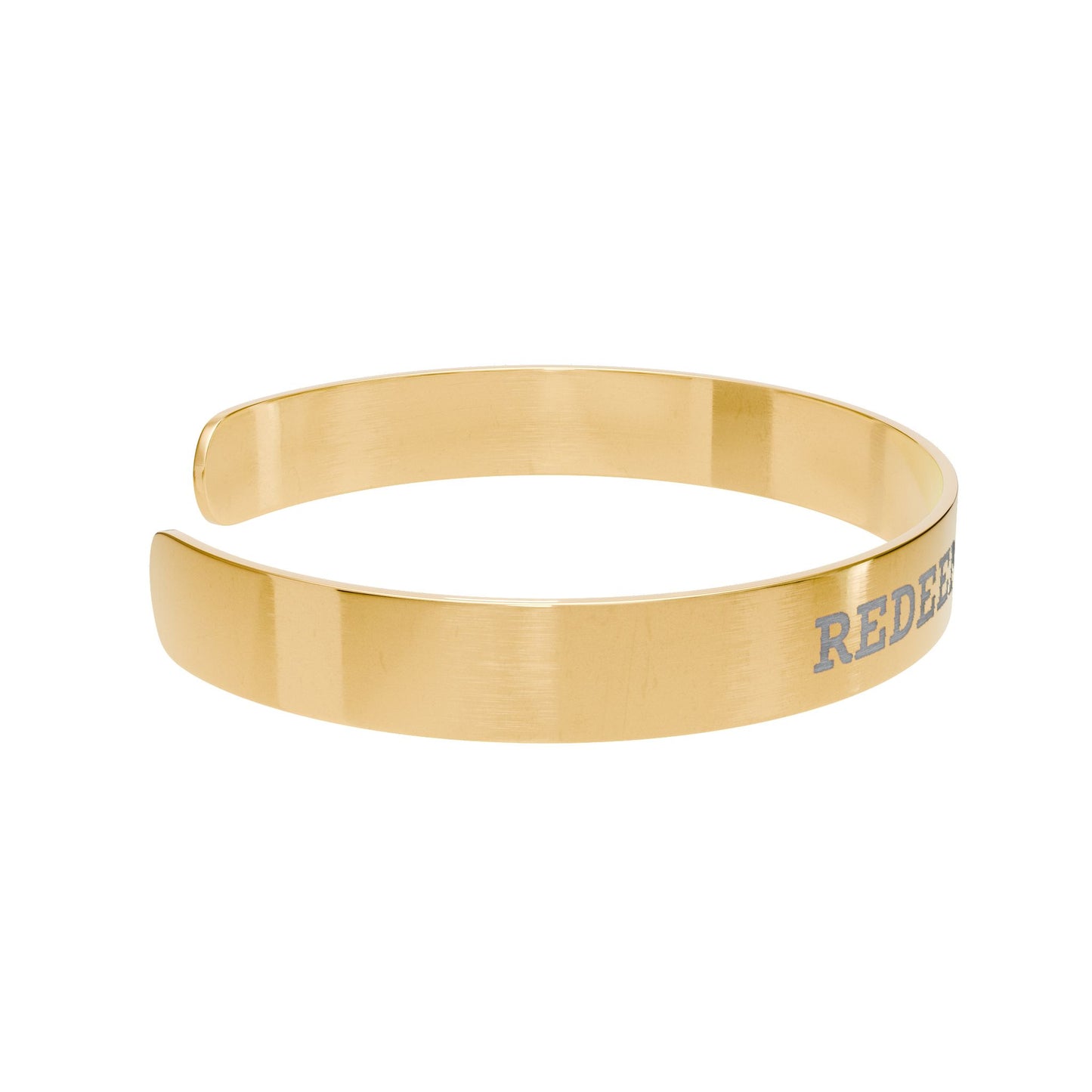Gold bangle with 'REDEEM' engraving on a white background