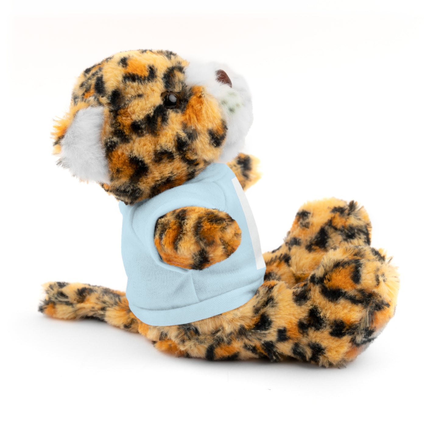 Plush toy tiger wearing a blue shirt on a white background