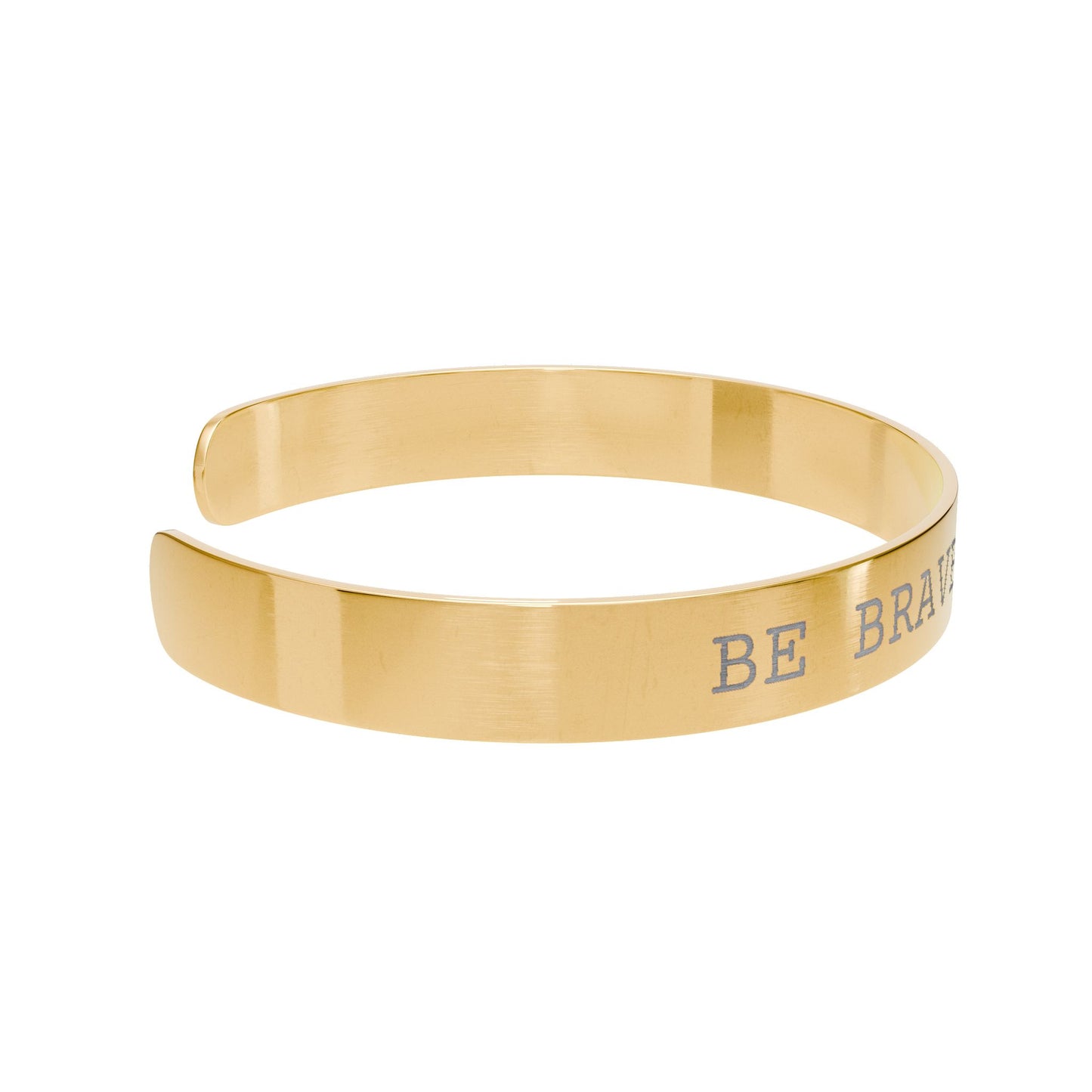 Gold bangle with 'BE BRAVE' engraving on a white background