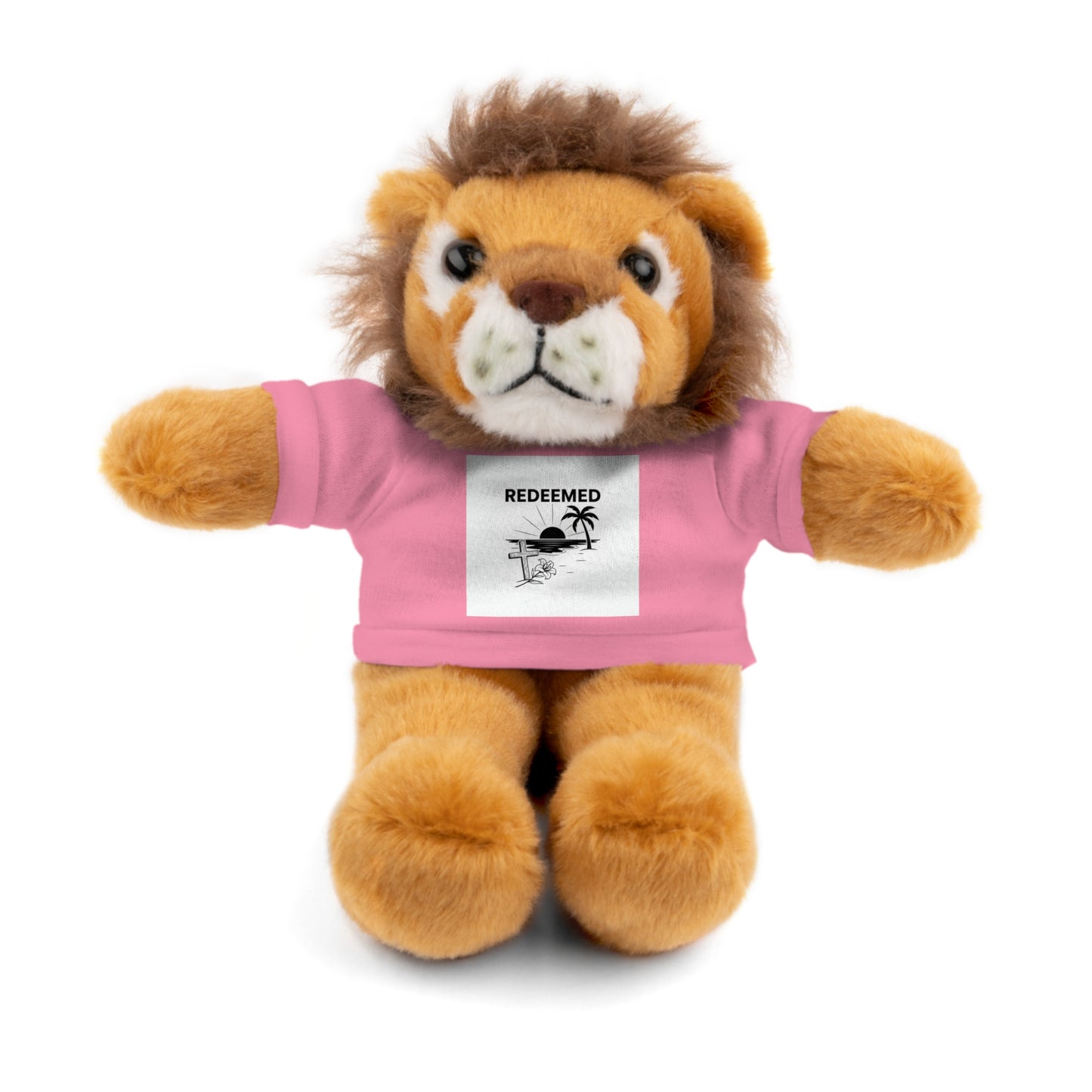 Stuffed lion toy wearing a pink shirt with a 'REDEEMED' graphic on a white background