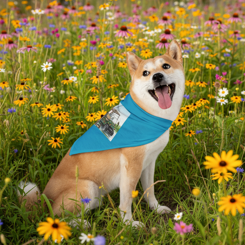 Dog wearing a blue bandana, sitting in a field of colorful flowers.
