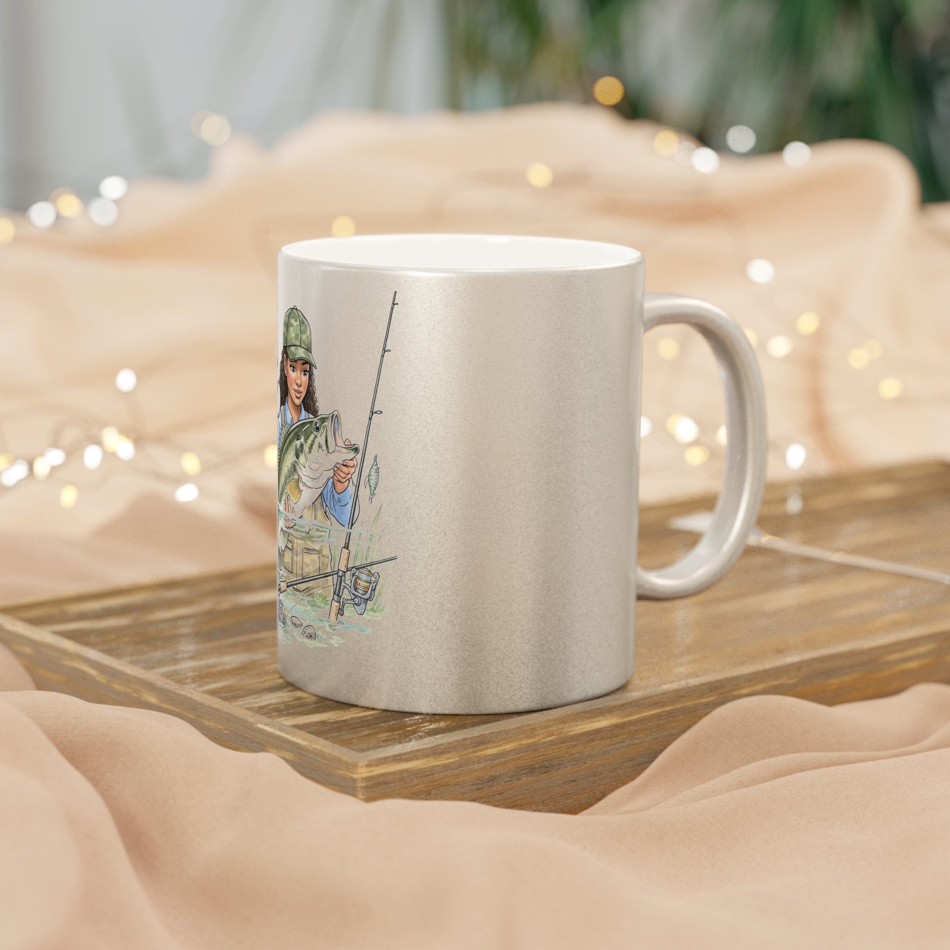 Silver metallic mug with a graphic design on a wooden surface with a soft, blurred background