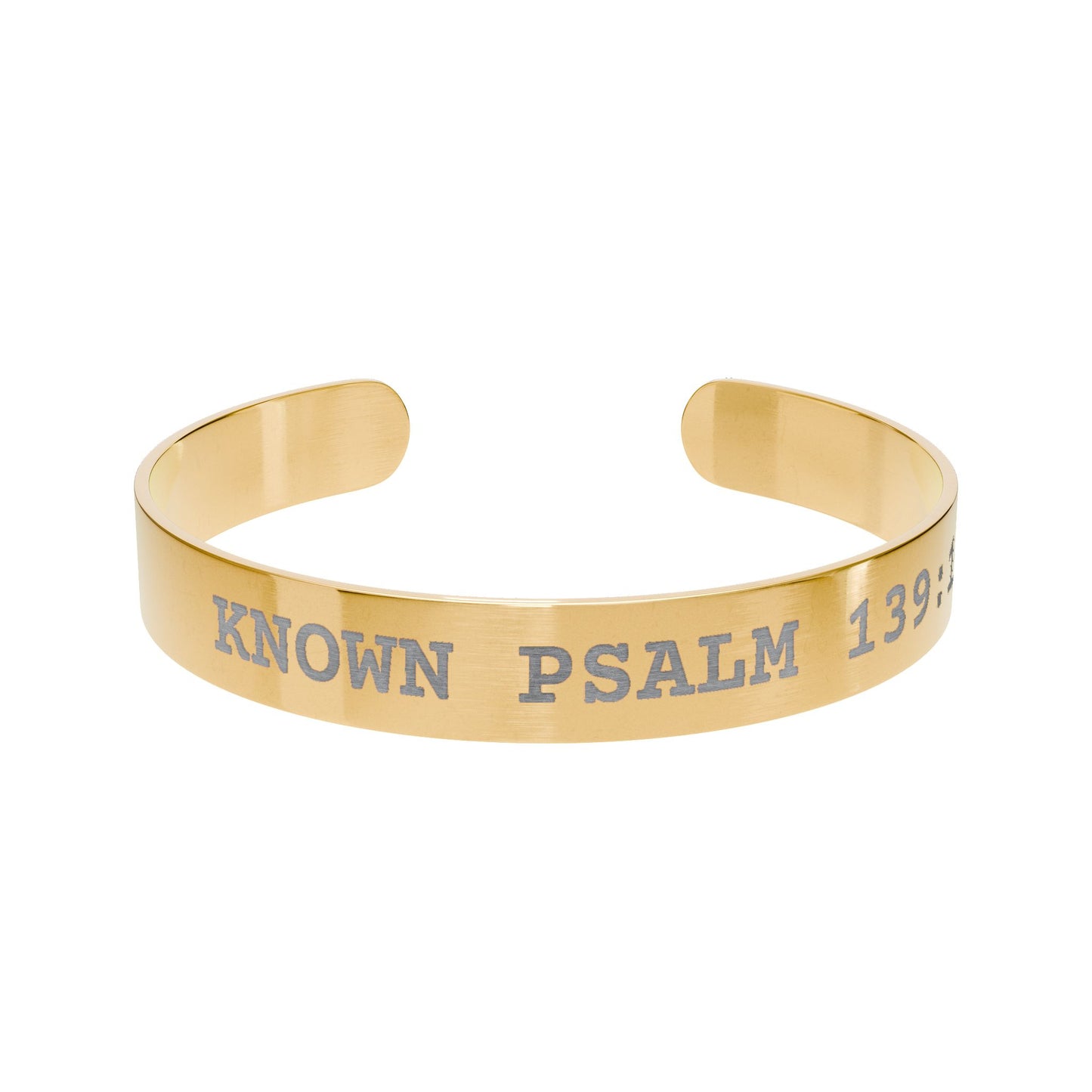 Gold bracelet with engraved text on a white background
