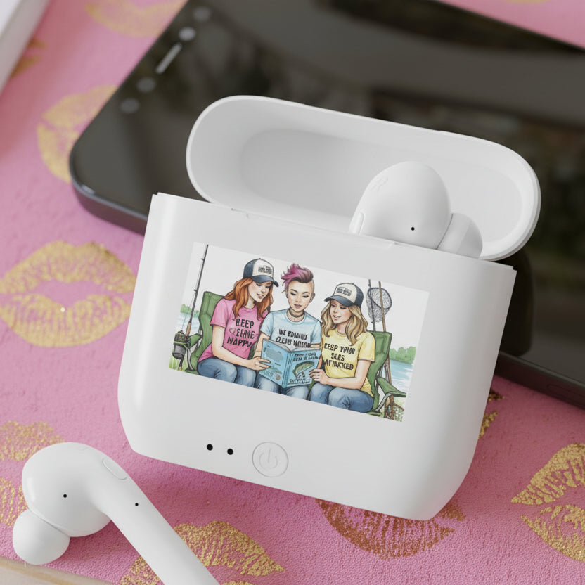 Product photography of white Eco-Boost wireless earbuds and charging case on a soft pink satin background decorated with gold kisses. The case displays the Reel Girls conservation message on the image of 3 female anglers on their shirts in bold lettering, designed for environmentally conscious anglers and outdoor enthusiasts.
