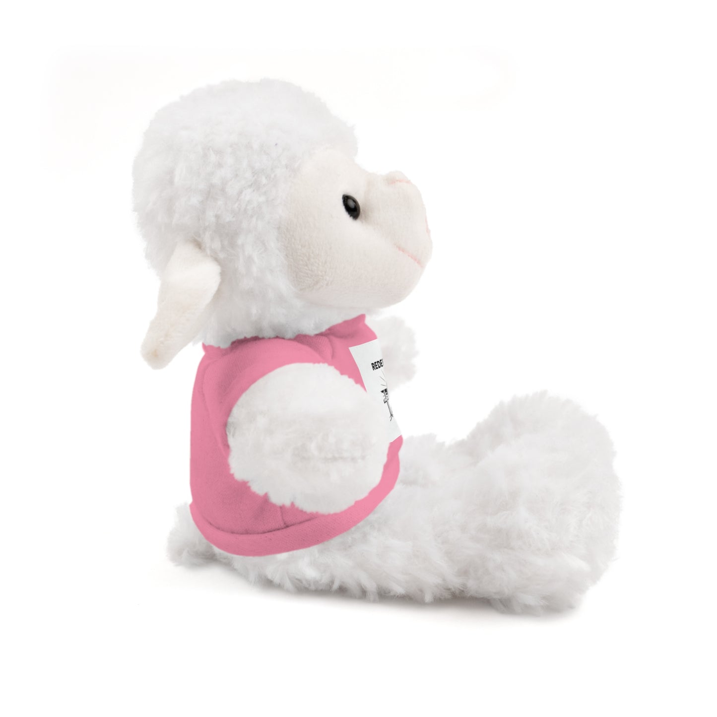 White plush toy with a pink shirt on a white background