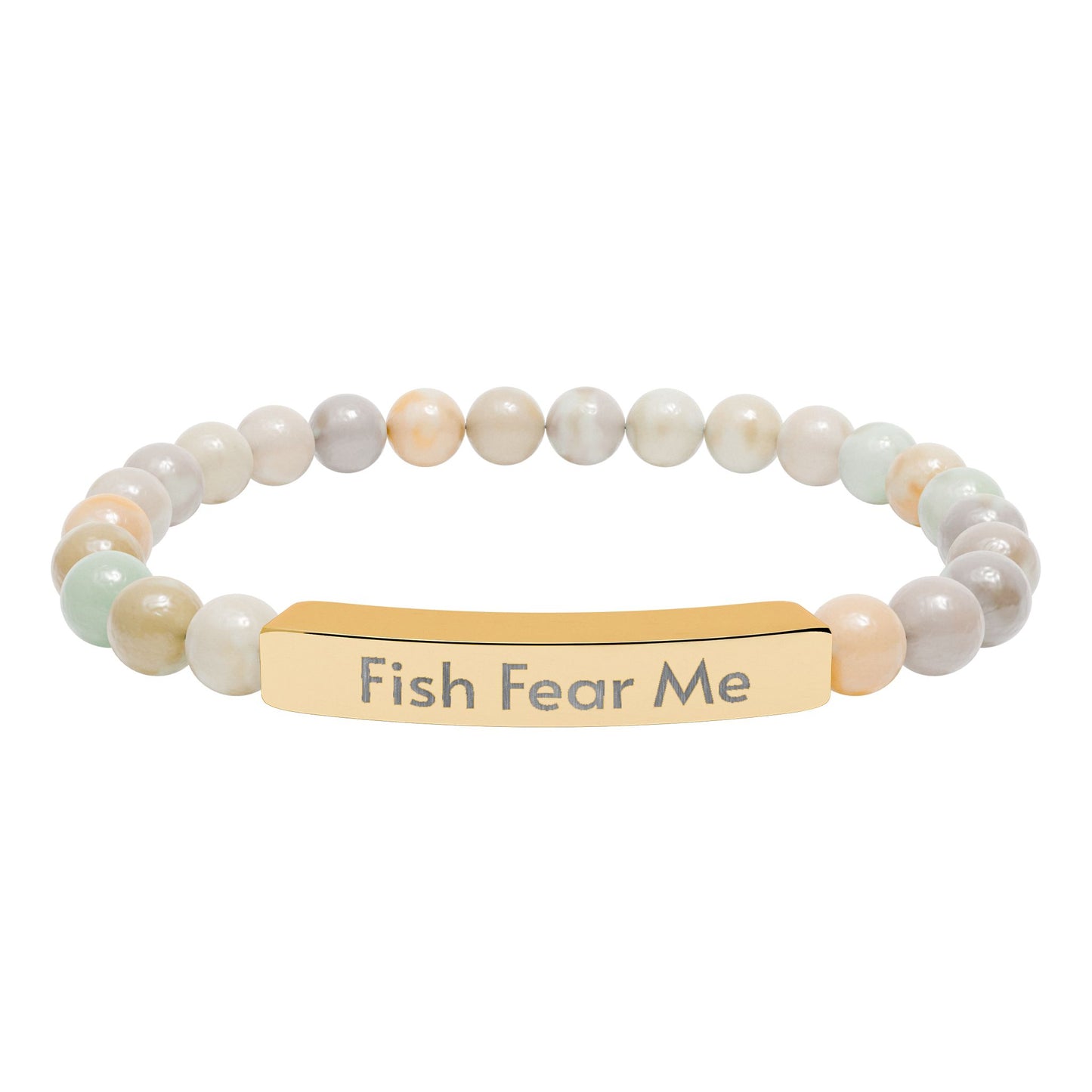 Bracelet with beige beads and gold bar with 'Fish Fear Me' engraving on a white background