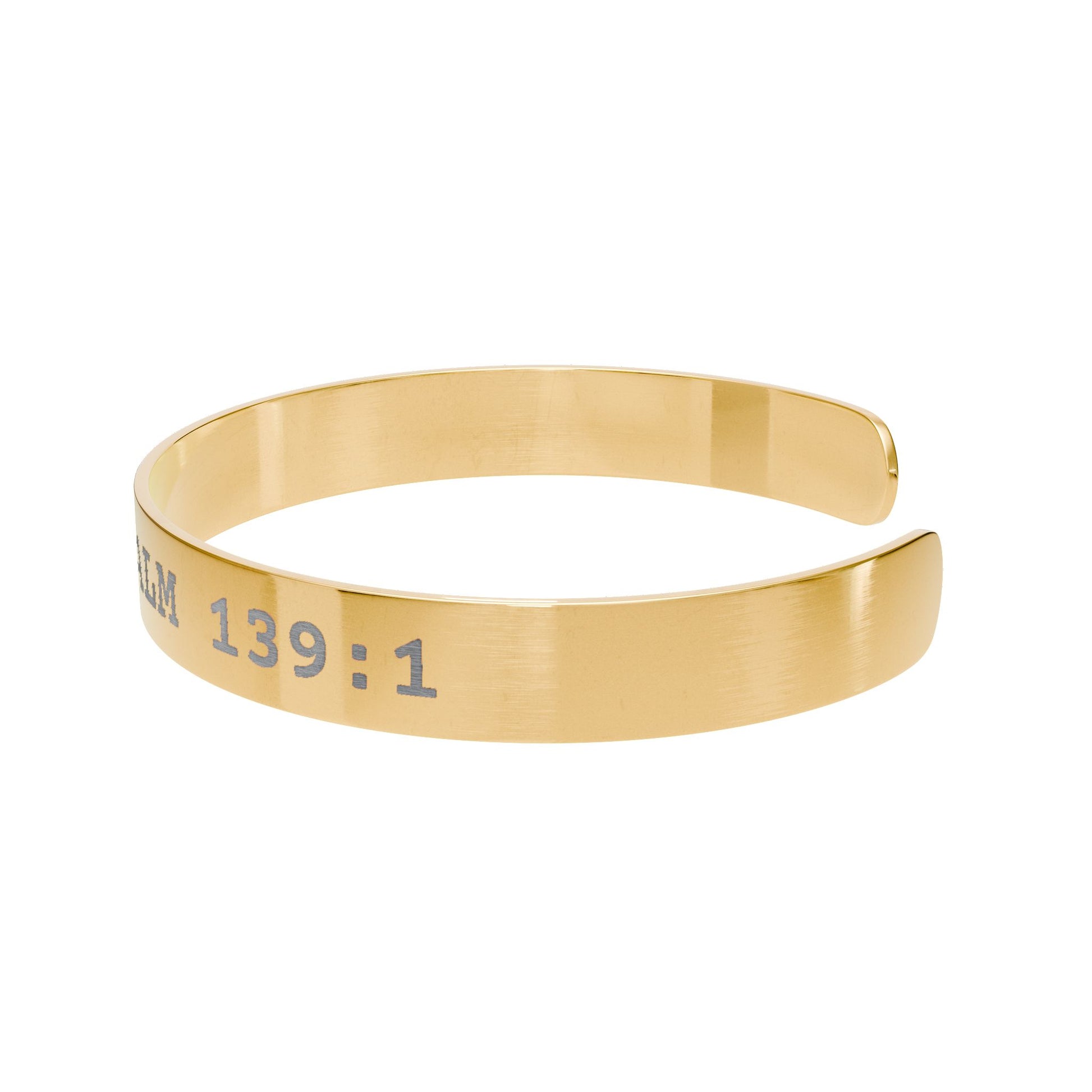 Gold bracelet with engraved text on a white background
