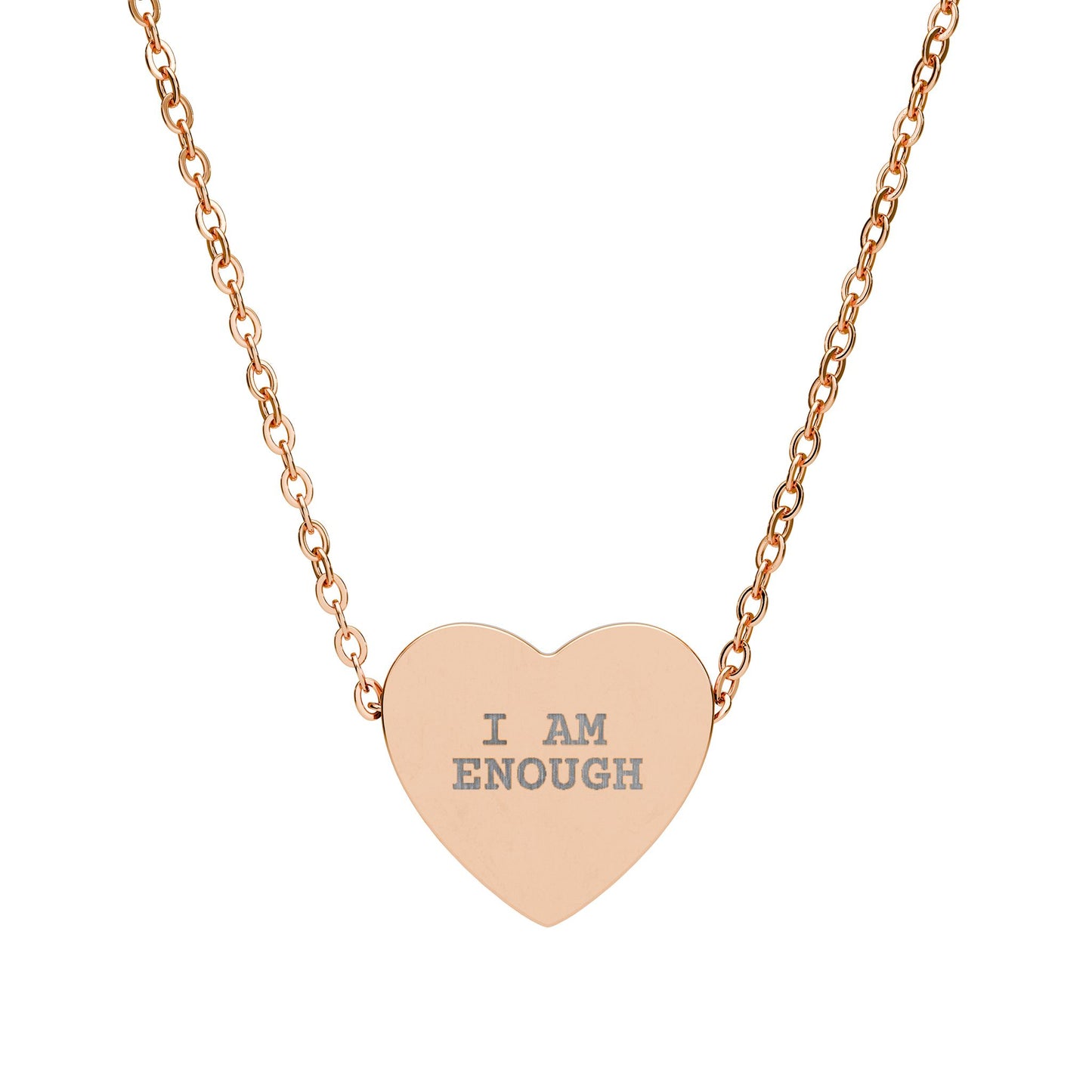 Rose gold heart-shaped necklace with 'I AM ENOUGH' engraving on a white background