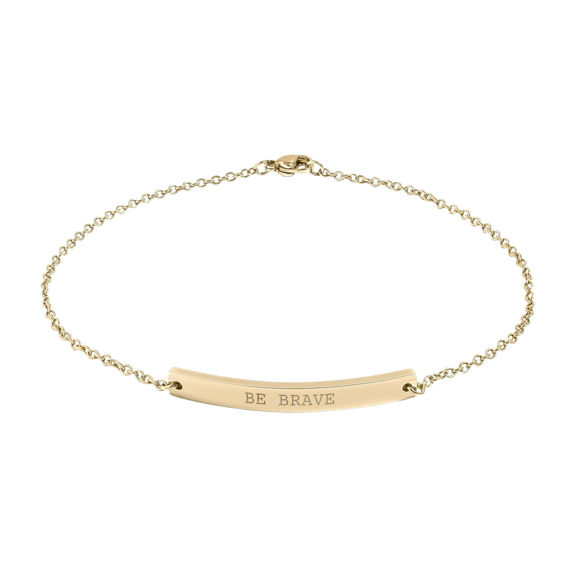 Gold anklet with 'BE BRAVE' engraving on a white background