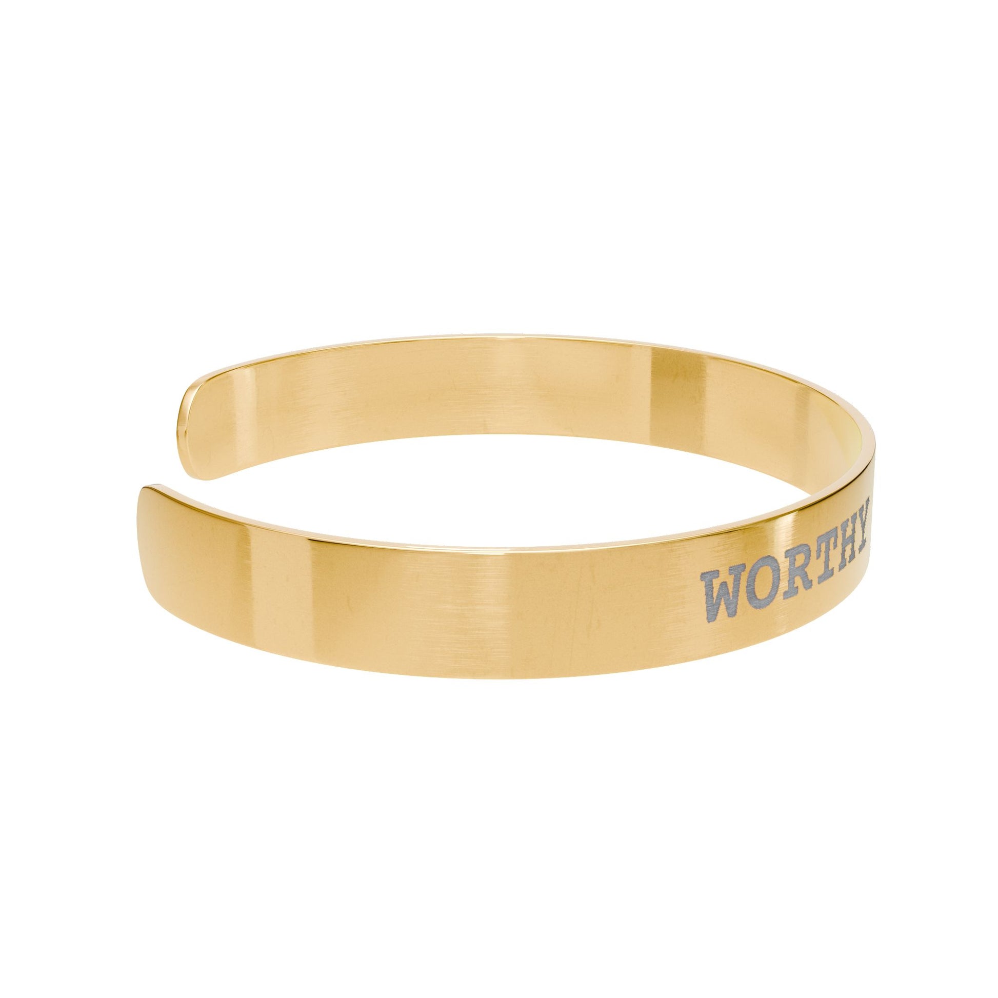 Gold bracelet with 'WORTHY' engraving on a white background