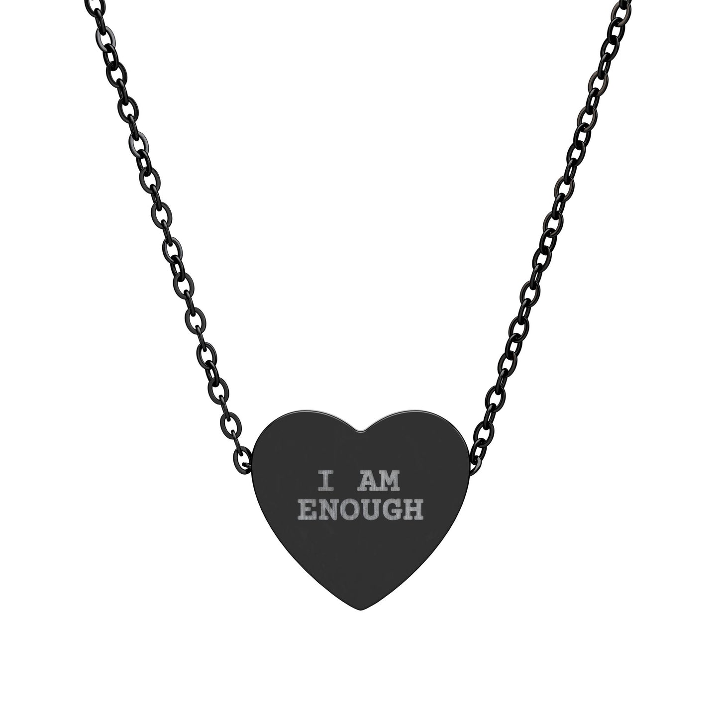 Heart-shaped pendant with 'I AM ENOUGH' engraving on a black chain against a white background
