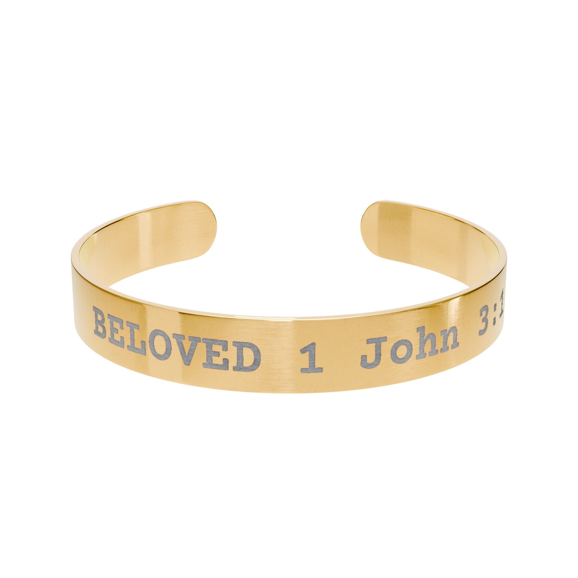 Gold cuff bracelet with engraved text on a white background