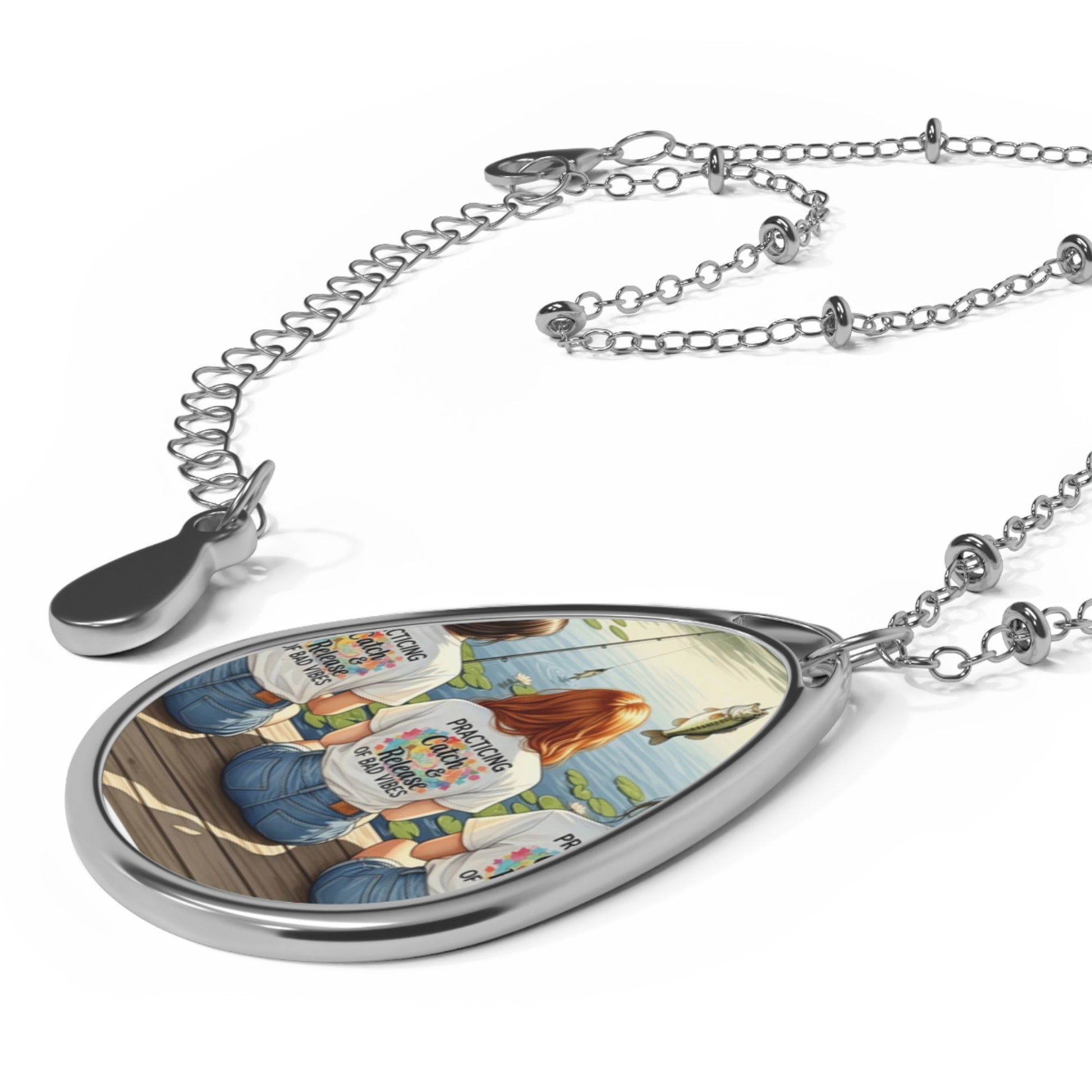 Teardrop-shaped pendant with a colorful design on a white background