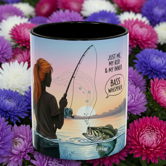 Ceramic mug with fishing design and text, surrounded by colorful flowers Image of girl fishing with a large bass emerging from the water about to take the bait. Cup says, "Just me. My Rod & My Inner Bass Whisperer.