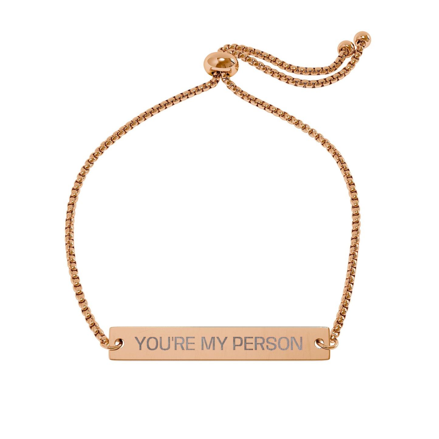 Rose gold bracelet with 'YOU'RE MY PERSON' engraving on a white background
