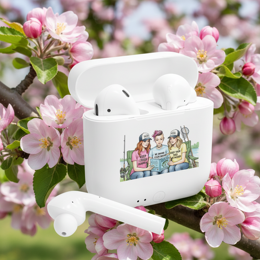 White wireless earbuds in a charging case with a floral background
